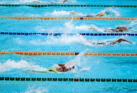 Pool Games - People Doing Swim Race